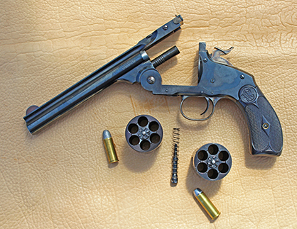 The Uberti replica of Smith and Wesson New Model No. 3 with 44 Special cylinder on left, as supplied by the factory and Uberti Schofield 44-40 cylinder on right.